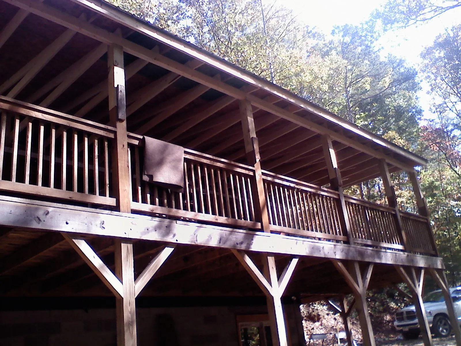 Timber framing under a new elevated porch and deck — Roof Leak Repair in Assonet by Roofing Brothers